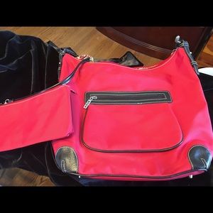 15” wide and 20” from bottom to top of handle.